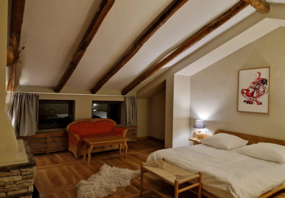Attic with fireplace